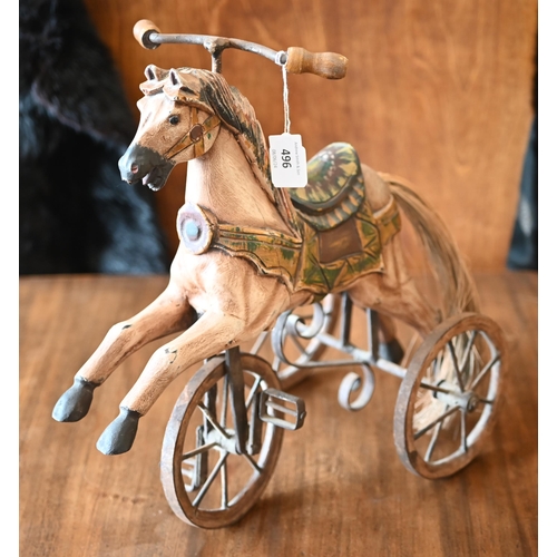 496 - A miniature 'hobby horse' tricycle 35 x 35 cm