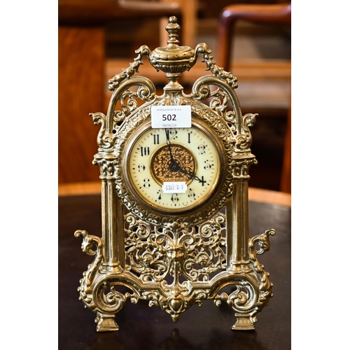 502 - # An antique mantel clock with drum movement in ornate Florentine brass strut frame, 32 cm high