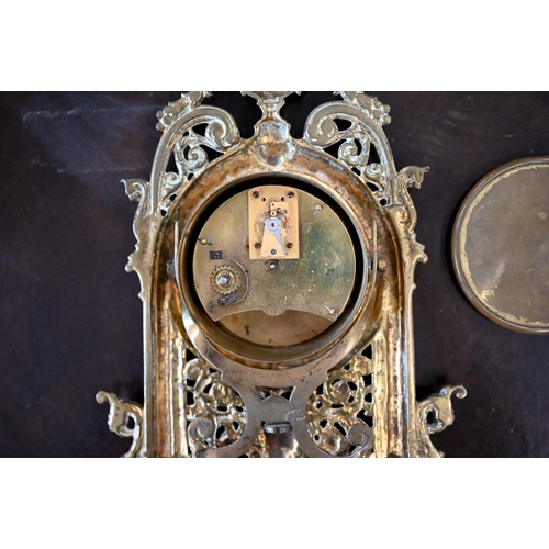 502 - # An antique mantel clock with drum movement in ornate Florentine brass strut frame, 32 cm high