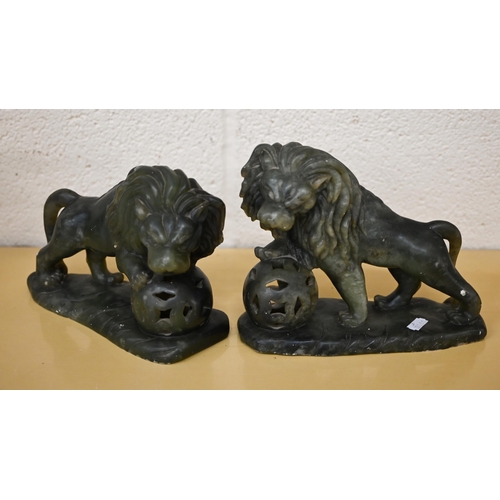 510 - A pair of Chinese serpentine lions, 20 cm long