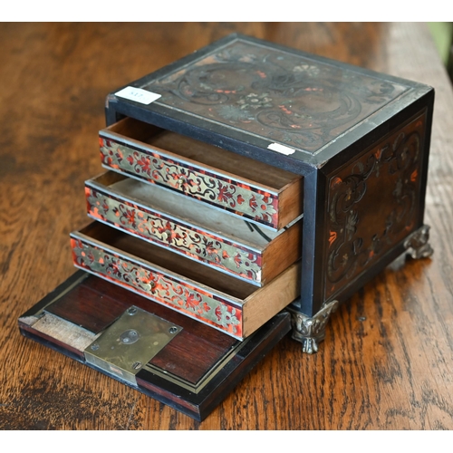 517 - A 19th century continental contre-boulle ebonized and inlaid table cabinet with fall-front enclosing... 