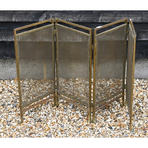 520 - # A four-fold brass fire-screen, 134 cm wide overall to/w copper pots, tray, fire irons and kettle