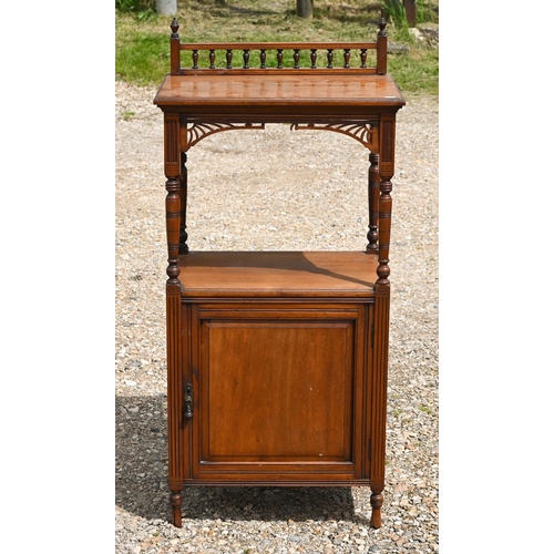 535 - # An Edwardian walnut side cabinet with gallery top