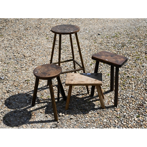 537 - Three rustic milking/cutty stools to/w a metal framed bar stool (4)