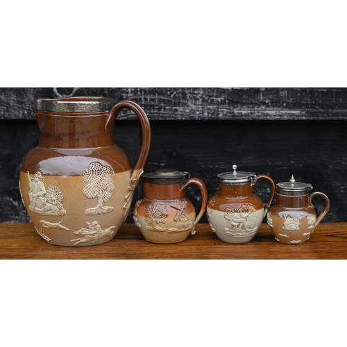 434 - # A Victorian Royal Doulton stoneware harvest jug with silver rim, to/w a mustard pot with silver co... 