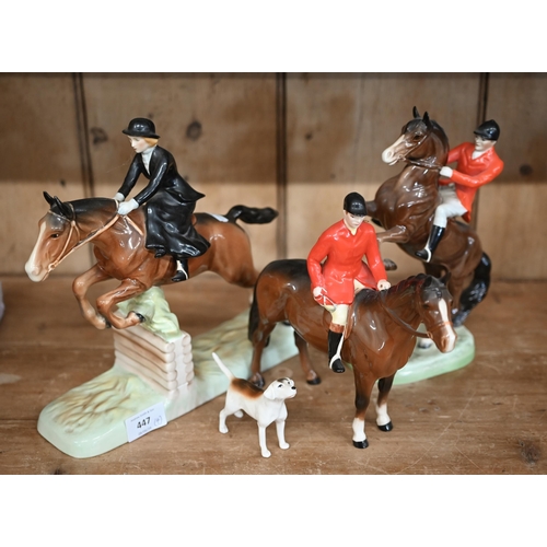 447 - Two Beswick huntsmen and a huntswoman to/w a fox-hound (4)