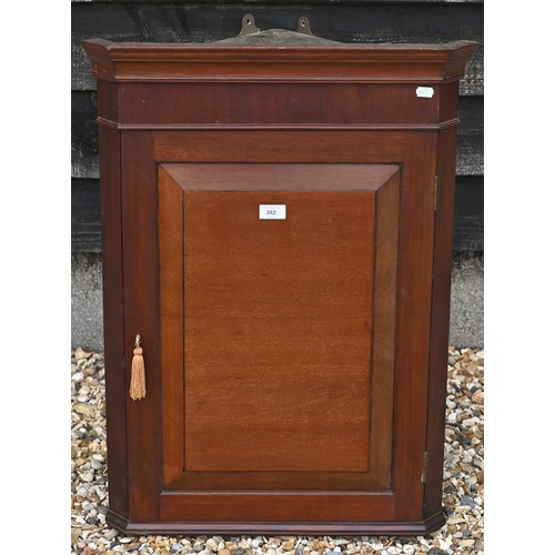 282 - # An antique mahogany hanging corner cupboard