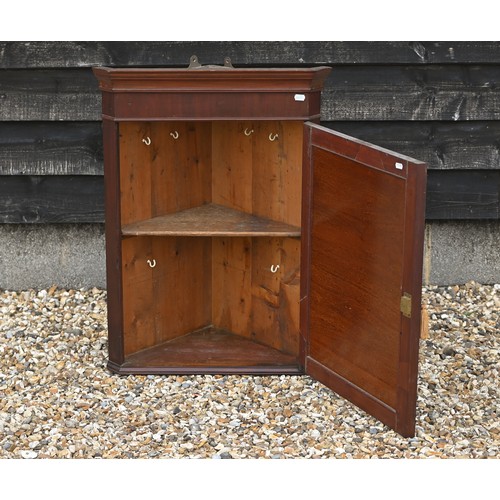 282 - # An antique mahogany hanging corner cupboard