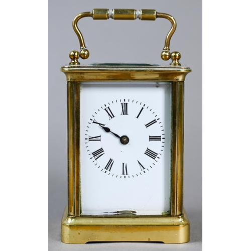 515 - A small French brass single drum 8-day carriage clock, with white enamelled dial with Roman numerals... 