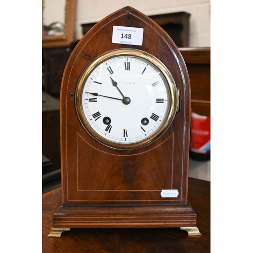 148 - An Edwardian lancet shaped eight-day mantel clock with enamel dial, striking on a coiled gong to/w p... 