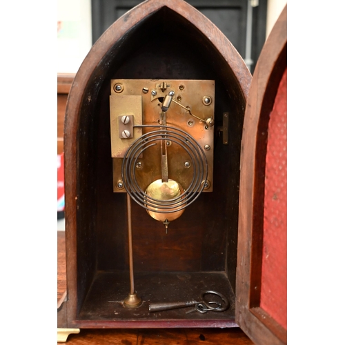 148 - An Edwardian lancet shaped eight-day mantel clock with enamel dial, striking on a coiled gong to/w p... 