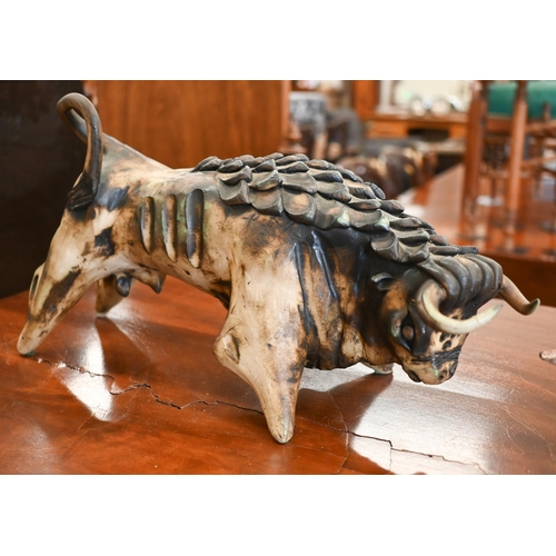 436 - André Lovet (Sidmouth, Devon) - a stoneware bull, signed, no 108, 36 cm long to/w an unmarked studio... 