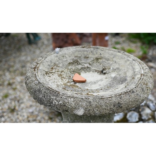 79 - A pair of flint encrusted domes or planters to/with a three piece composite birdbath, all a/f