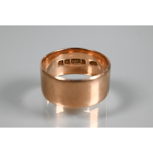 340 - A 9ct rose gold wide wedding band, approx 8mm wide, approx 5.9g, size U