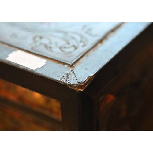 517 - A 19th century continental contre-boulle ebonized and inlaid table cabinet with fall-front enclosing... 