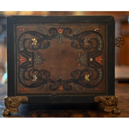 517 - A 19th century continental contre-boulle ebonized and inlaid table cabinet with fall-front enclosing... 