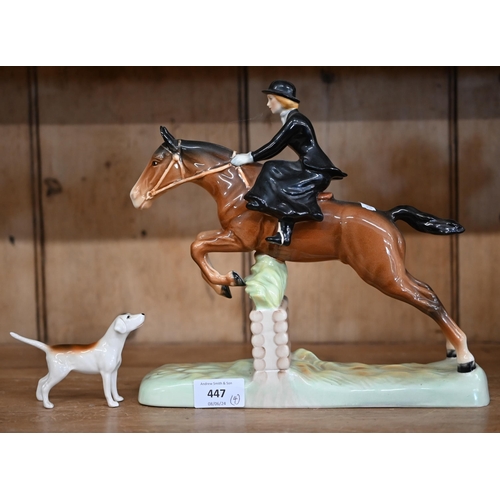 447 - Two Beswick huntsmen and a huntswoman to/w a fox-hound (4)