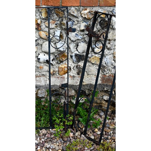 81 - A pair of low wrought iron drive gates, 119 cm x 87 cm h o/all (2)