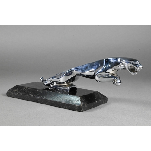 952 - A chrome Jaguar car mascot, 19cm long and a small 'Spirit of Ecstasy' mascot 7cm - both on stone pli... 