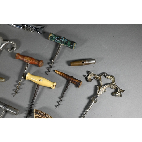 955 - Four Victorian corkscrews with turned wood handles, to/w three 19th century metal corkscrews and a s... 