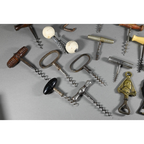 955 - Four Victorian corkscrews with turned wood handles, to/w three 19th century metal corkscrews and a s... 