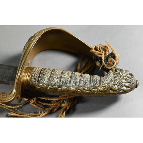 1006 - An antique Naval officer's sword, the 79.5 cm slightly curved blade with etched decoration, solid br... 