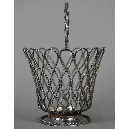 107 - A Victorian silver twisted wire sugar basket with swing handle and frosted blue glass liner, Elkingt... 