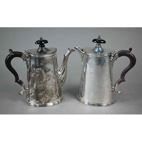 108 - A heavy quality silver café au lait pair of oval tapering form with composite handles and finials, H... 