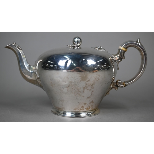 109 - A Victorian silver bullet-shaped teapot in the Georgian manner, with melon finial and octagonal spou... 