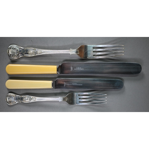10A - An oak canteen of epns Kings's pattern flatware, the knives with imitation ivory handles
