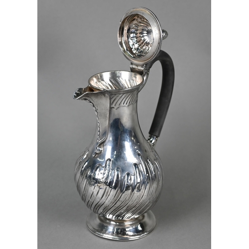 129 - A Victorian silver pear-shaped chocolate pot with spiral finial, ebonised handle and fluted and reed... 