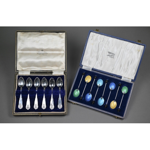 138 - A cased set of eight coffee spoons with coloured enamel backs and bean finials, Birmingham 1957, to/... 