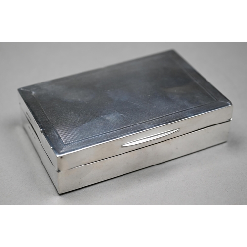 141 - An engine-turned cigarette case, London 1929, to/w a silver-mounted glass inkwell/paperweight, Birmi... 