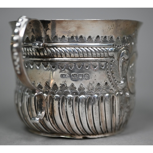 144 - A late Victorian silver porringer in the 17th Century manner, with twin scroll handles and embossed ... 