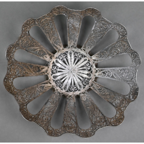 151 - A continental white metal filigree bowl on raised foot, 16cm diameter, to/w a set of six unmarked co... 