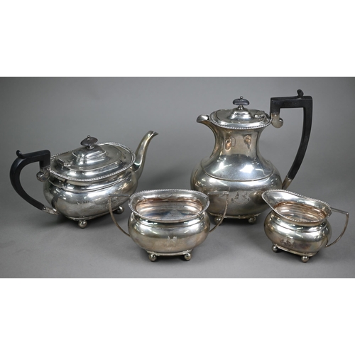 153 - A silver four-piece tea service with gadrooned rims and ball feet, composite mounts, engraved with t... 