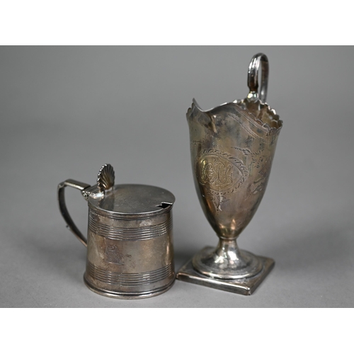 156 - A George III Adam-style helmet cream jug with cut rim and scroll handle, engraved decoration and ste... 