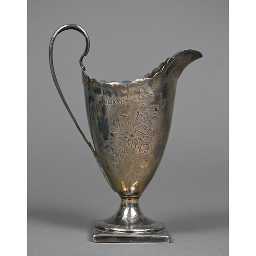 156 - A George III Adam-style helmet cream jug with cut rim and scroll handle, engraved decoration and ste... 