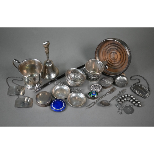 16 - Various oddments of silver, including Christening cup, table bell, two Concorde decanter labels for ... 