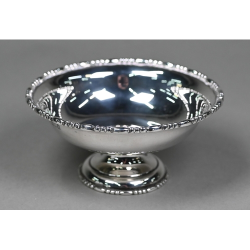 169 - An Edwardian silver bonbon bowl on stemmed foot, London 1904, an oval dish, Birmingham 1912, a cut g... 