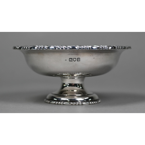 169 - An Edwardian silver bonbon bowl on stemmed foot, London 1904, an oval dish, Birmingham 1912, a cut g... 