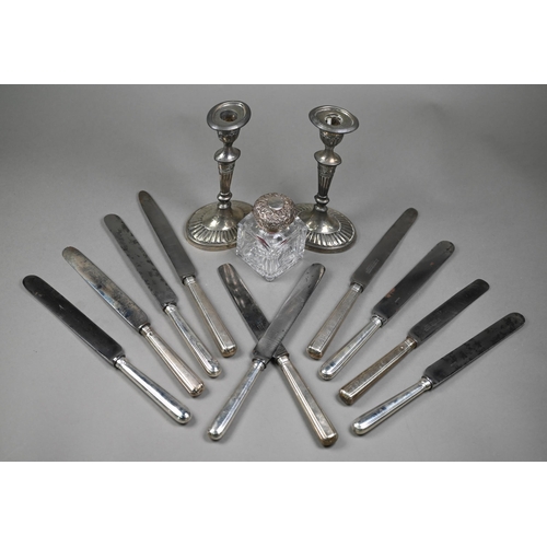 172 - A late Victorian pair of loaded silver oval baluster candlesticks in the Adam Revival manner, Hollan... 