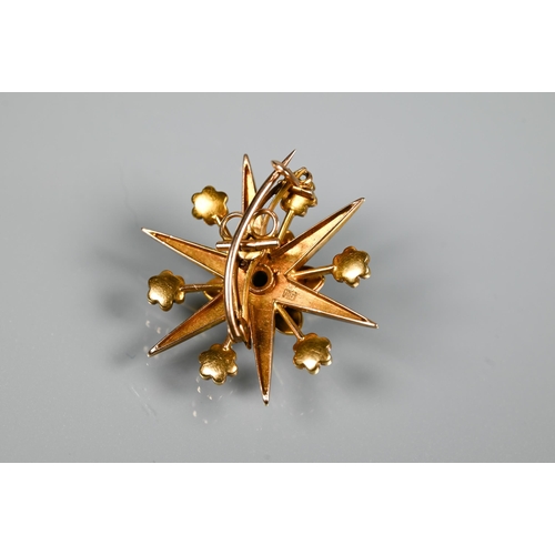 208 - A Victorian 15 ct yellow gold brooch in the form of a star, set overall with seed pearls, 3.5 cm, wi... 