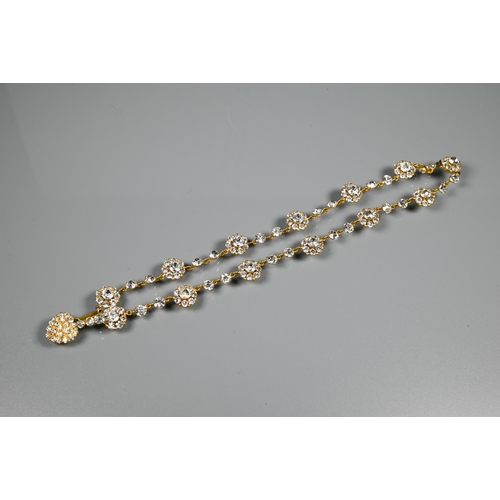 209 - A vintage necklace formed of alternate white paste clusters and single pastes, closed back settings ... 