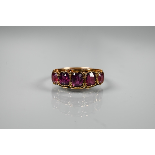 212 - Three gold rings, one Victorian set rubies and diamonds, size P, unmarked, one 15ct set five graduat... 