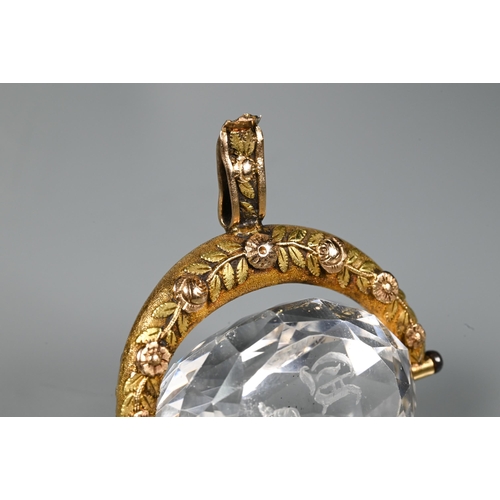 214 - An antique gold and crystal swivel fob seal with crest and initialsHanger misshapen