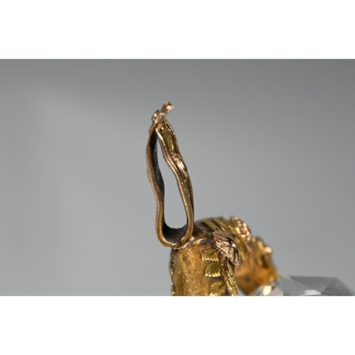 214 - An antique gold and crystal swivel fob seal with crest and initialsHanger misshapen