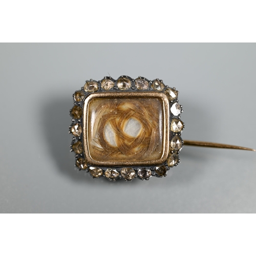 216 - A Georgian rose-cut diamond-set mourning brooch with hairwork panel, white chalcedony back and silve... 