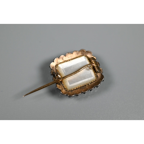 216 - A Georgian rose-cut diamond-set mourning brooch with hairwork panel, white chalcedony back and silve... 