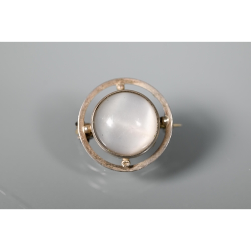 233 - A Charles Horner silver brooch with cabochon moonstone, 1.8cm diam; an circular enamelled trinket po... 